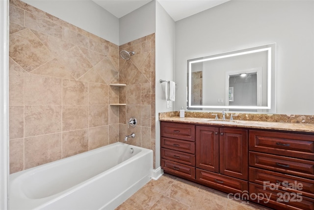 bathroom with vanity and tiled shower / bath combo