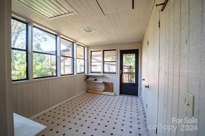 sunroom / solarium with plenty of natural light