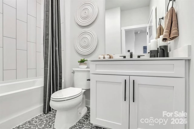 bathroom with vanity, toilet, and shower / bath combo