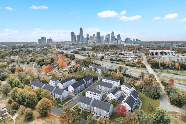 drone / aerial view featuring a city view