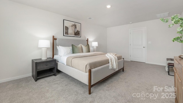 bedroom featuring light colored carpet, visible vents, and baseboards