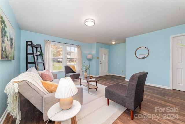 living room featuring dark hardwood / wood-style floors