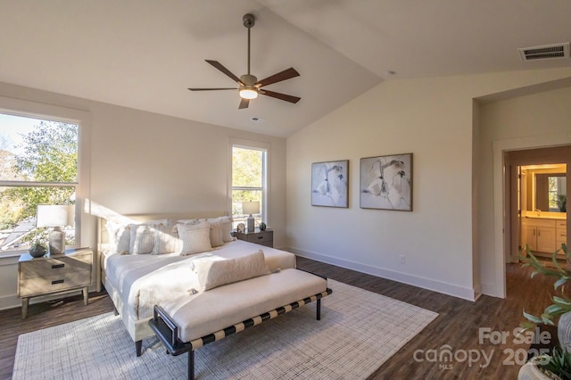 bedroom with ceiling fan, dark hardwood / wood-style flooring, lofted ceiling, and multiple windows