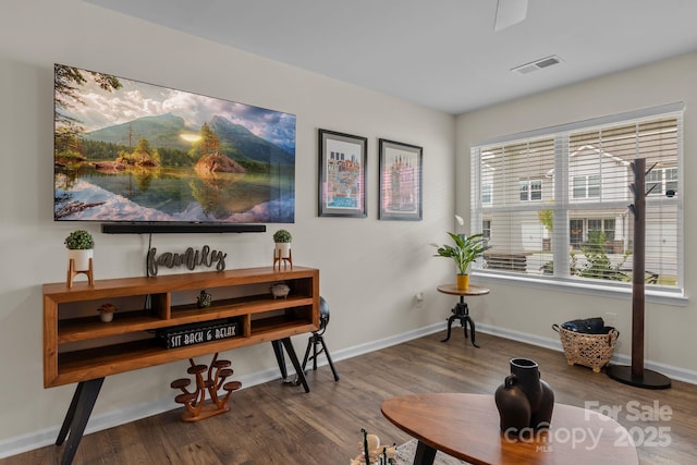 misc room with hardwood / wood-style flooring and plenty of natural light