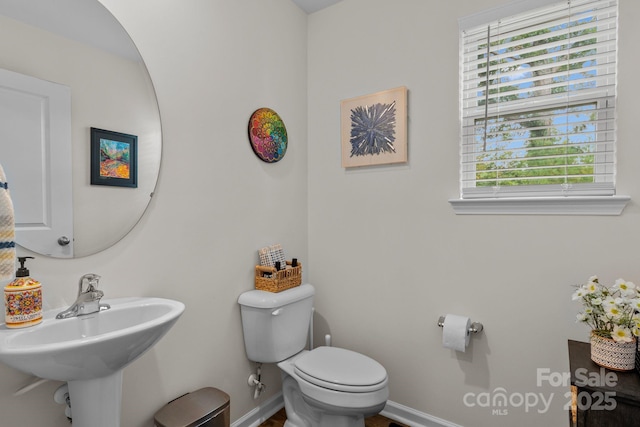 bathroom with sink and toilet