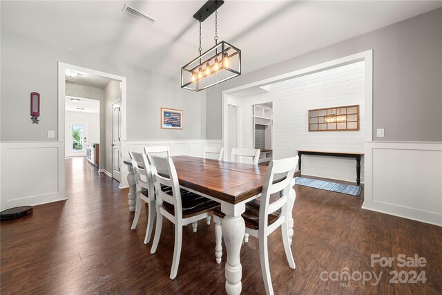 dining room featuring dark hardwood / wood-style floors