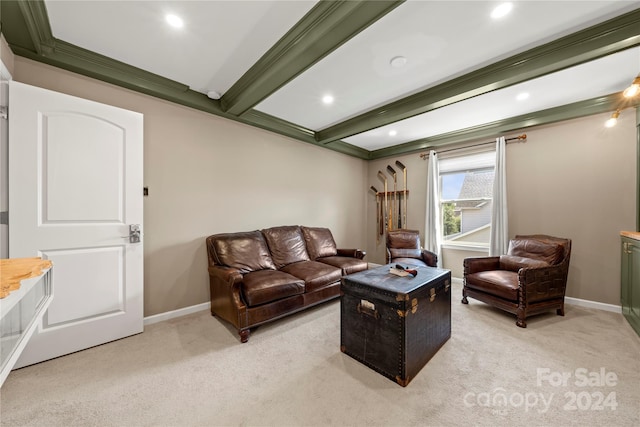 carpeted living room featuring ornamental molding and beam ceiling