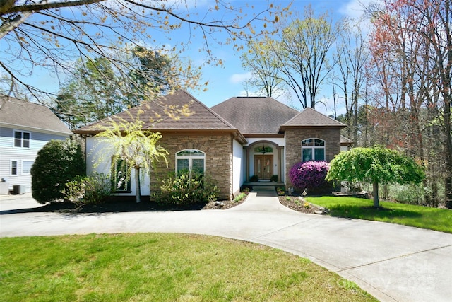 view of front of home with a front yard