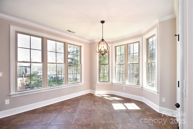 unfurnished dining area with a wealth of natural light and ornamental molding