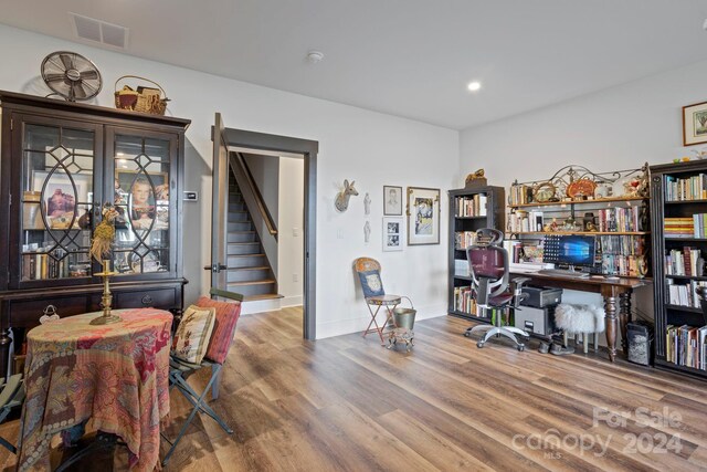 office space with hardwood / wood-style floors