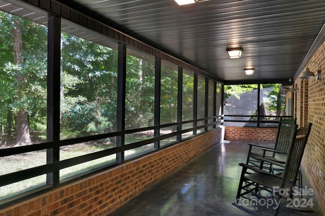 sunroom featuring a healthy amount of sunlight