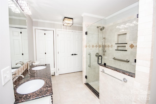 bathroom with an enclosed shower, tile patterned floors, ornamental molding, toilet, and vanity