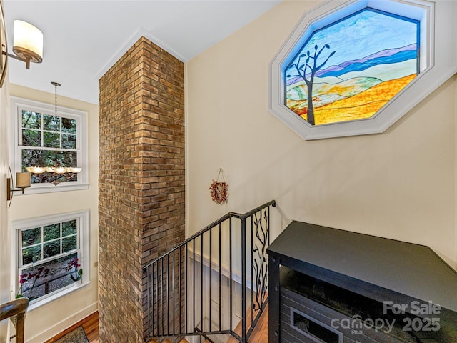 stairway featuring hardwood / wood-style floors