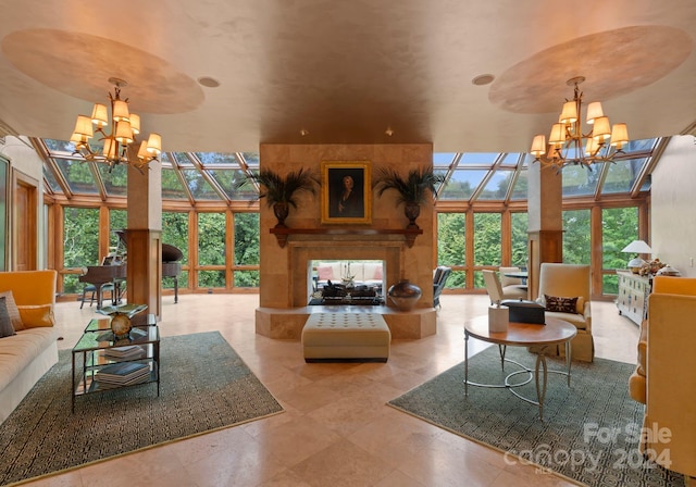 unfurnished living room with expansive windows, an inviting chandelier, and a wealth of natural light