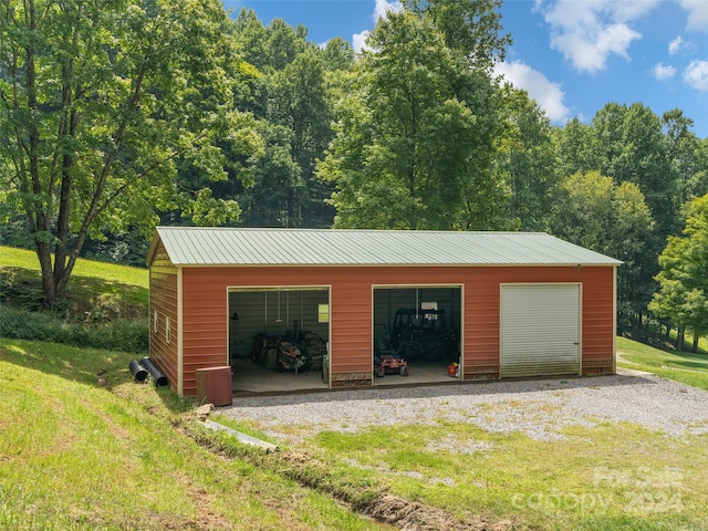 garage with a yard