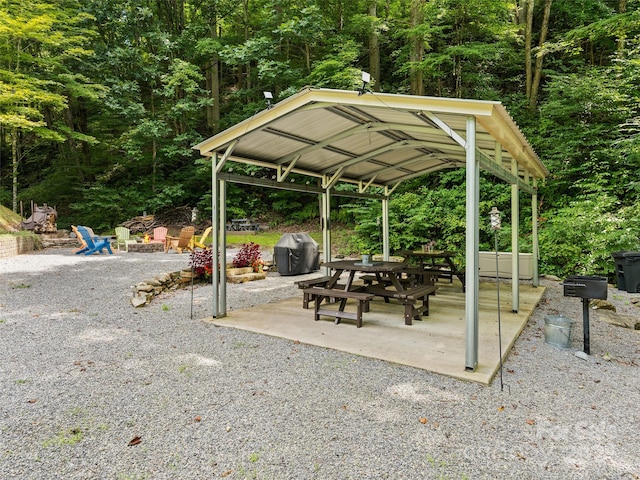 view of patio featuring area for grilling and an outdoor fire pit