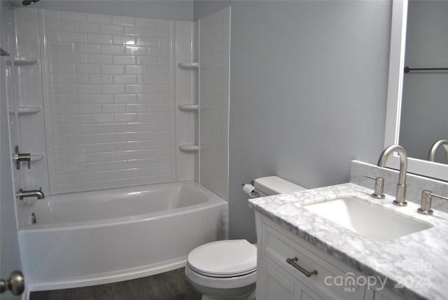 full bathroom featuring shower / tub combination, wood-type flooring, toilet, and vanity