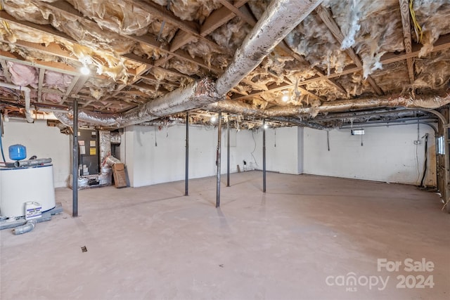 unfinished below grade area featuring heating unit