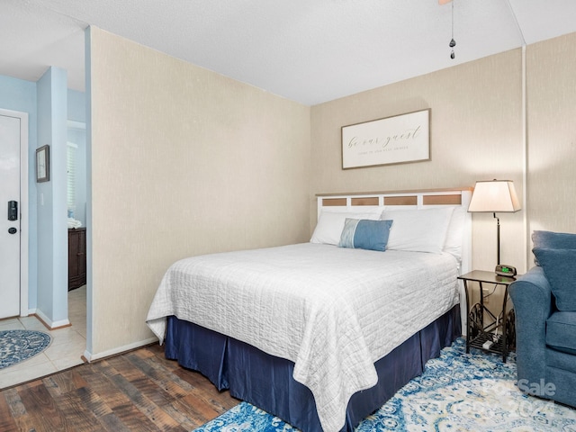 bedroom featuring dark wood-type flooring