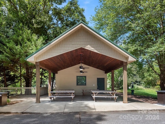 view of property's community with a patio area