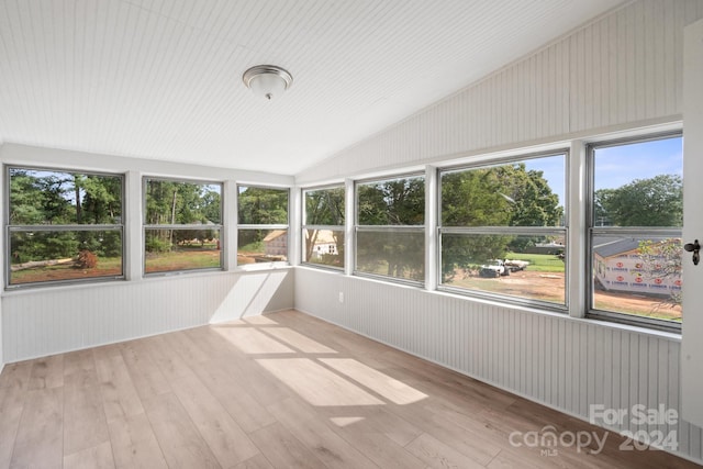 unfurnished sunroom featuring a wealth of natural light