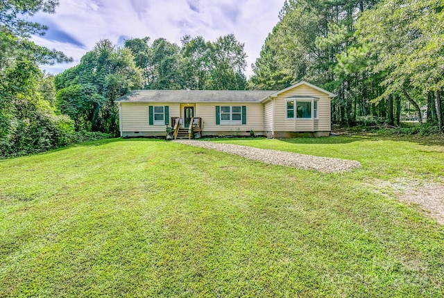 ranch-style house with a front yard