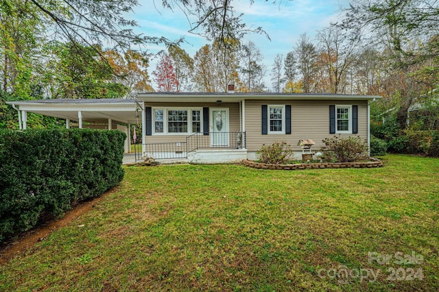 single story home with a carport and a front lawn