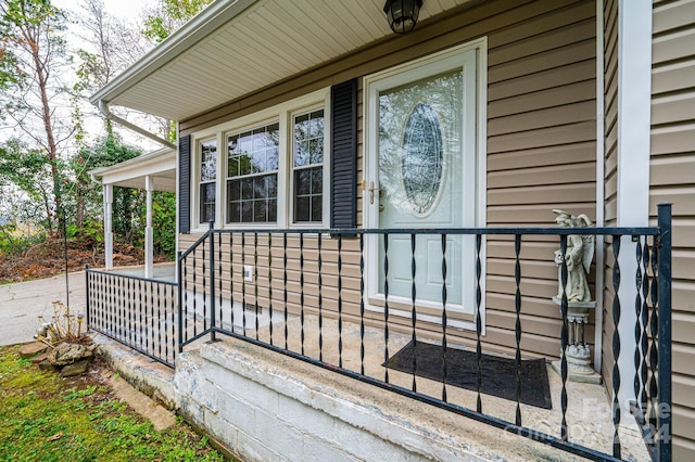 doorway to property with a porch