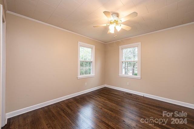 unfurnished room with ceiling fan, dark hardwood / wood-style flooring, and ornamental molding