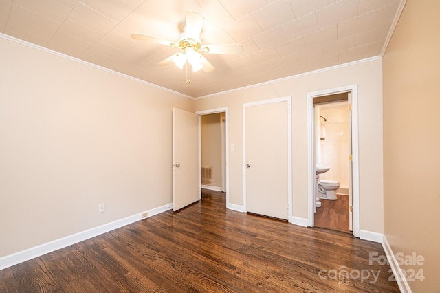 unfurnished bedroom with ceiling fan, crown molding, dark wood-type flooring, and connected bathroom