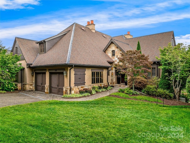 view of front of home with a front lawn