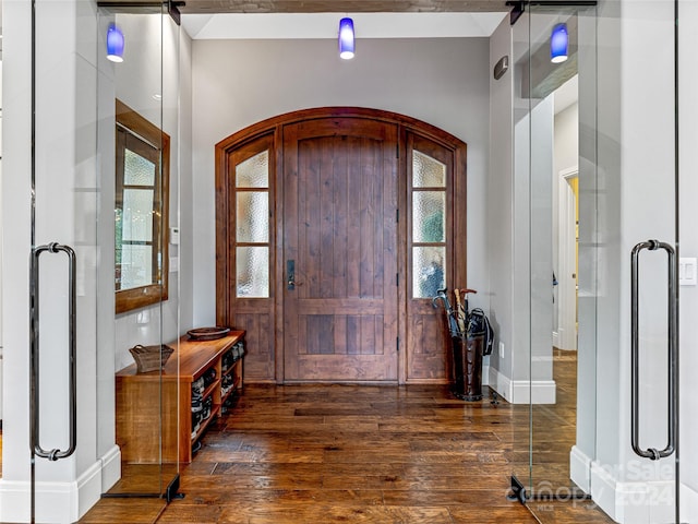 22 Foxbridge Way, Arden, NC 28704 - foyer featuring arched walkways, wood-type flooring, healthy amount of natural light, and baseboards
