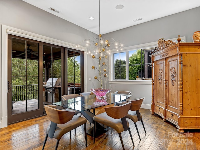 22 Foxbridge Way, Arden, NC 28704 - dining space with hardwood / wood-style floors, a chandelier, recessed lighting, and baseboards