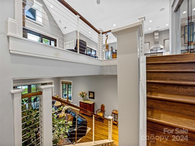 22 Foxbridge Way, Arden, NC 28704 - stairs with a high ceiling, wood finished floors, and recessed lighting