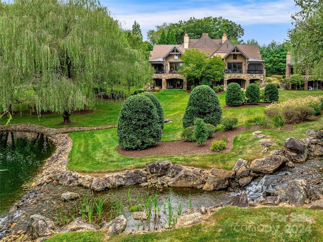 22 Foxbridge Way, Arden, NC 28704 - surrounding community featuring a lawn