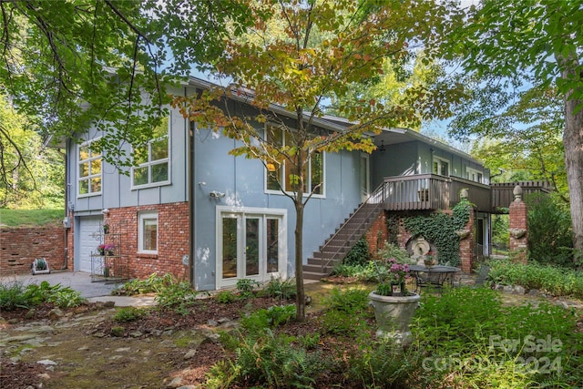 view of property exterior with a garage