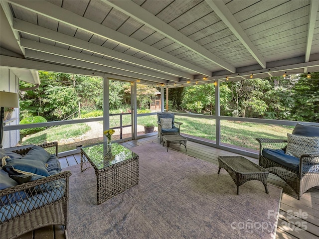 sunroom / solarium featuring wood ceiling and beamed ceiling