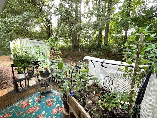 wooden balcony featuring a deck