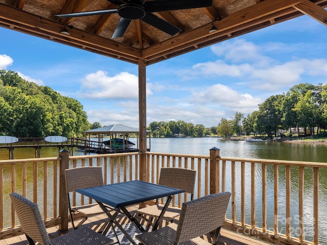 wooden deck featuring a water view