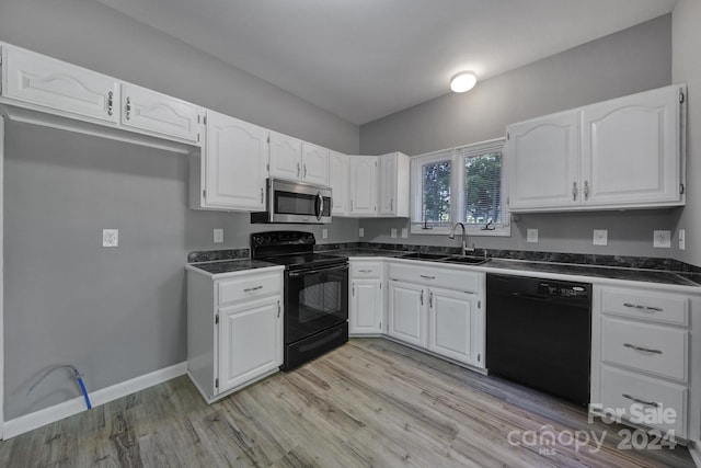 kitchen featuring light wood-type flooring, black appliances, white cabinetry, and sink