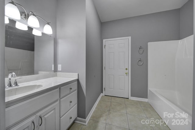 bathroom with vanity, shower / bath combination, and tile patterned floors