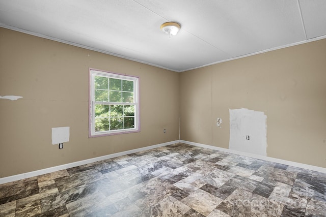 unfurnished room featuring ornamental molding