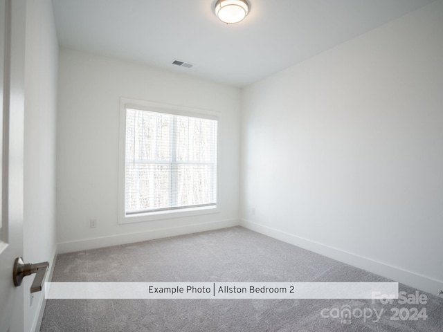 view of carpeted spare room