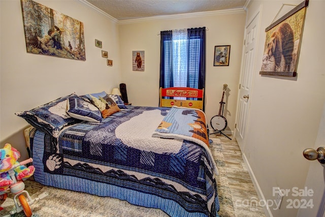 bedroom with carpet flooring, crown molding, and a textured ceiling