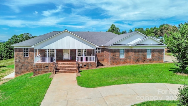 ranch-style house featuring a front yard and a porch