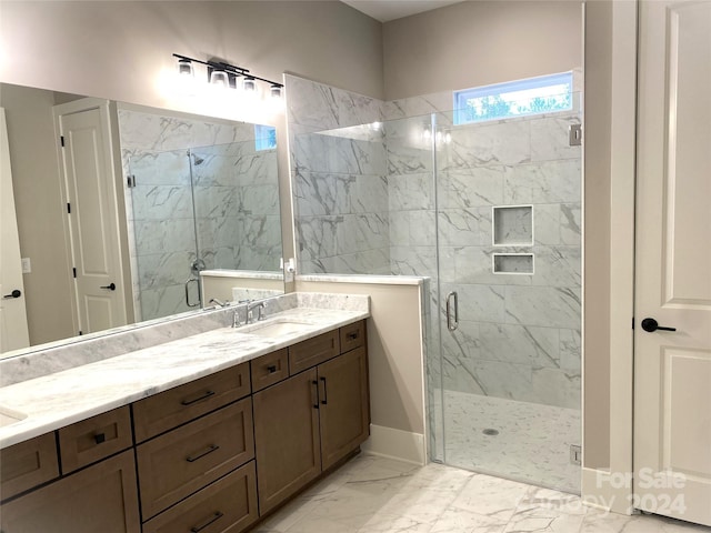 bathroom featuring vanity and walk in shower