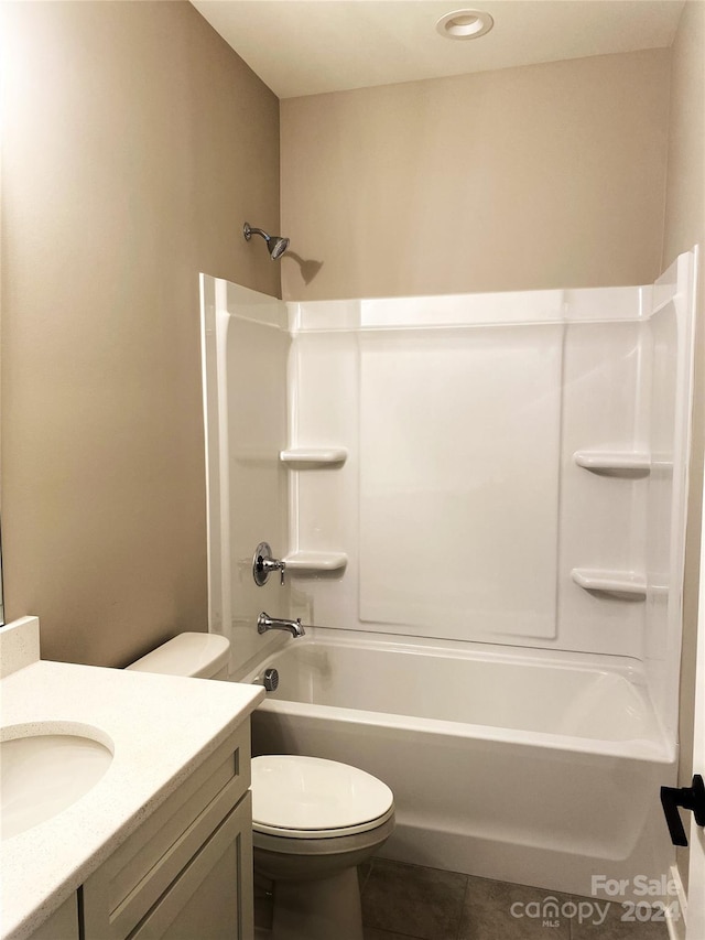 full bathroom featuring tile patterned flooring, vanity, toilet, and shower / bath combination