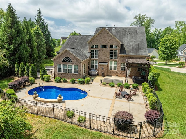 view of swimming pool featuring a pergola, a yard, and a patio