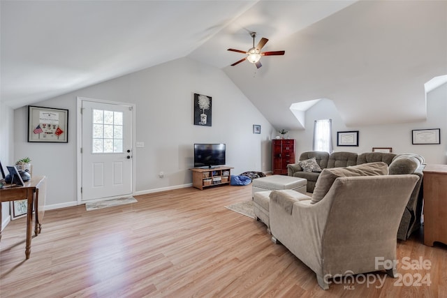 living room with light wood-type flooring, ceiling fan, and lofted ceiling