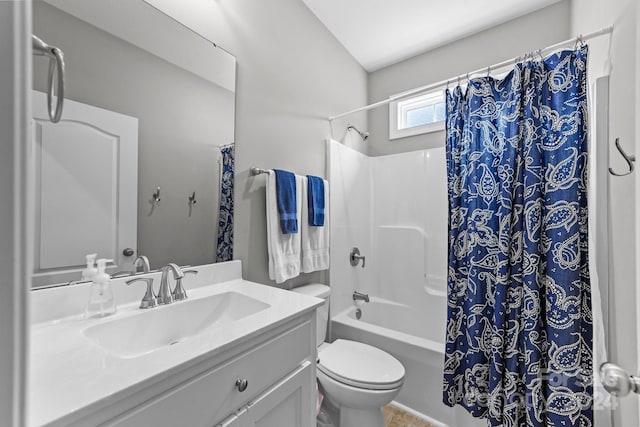 full bathroom featuring shower / bath combination with curtain, toilet, and vanity